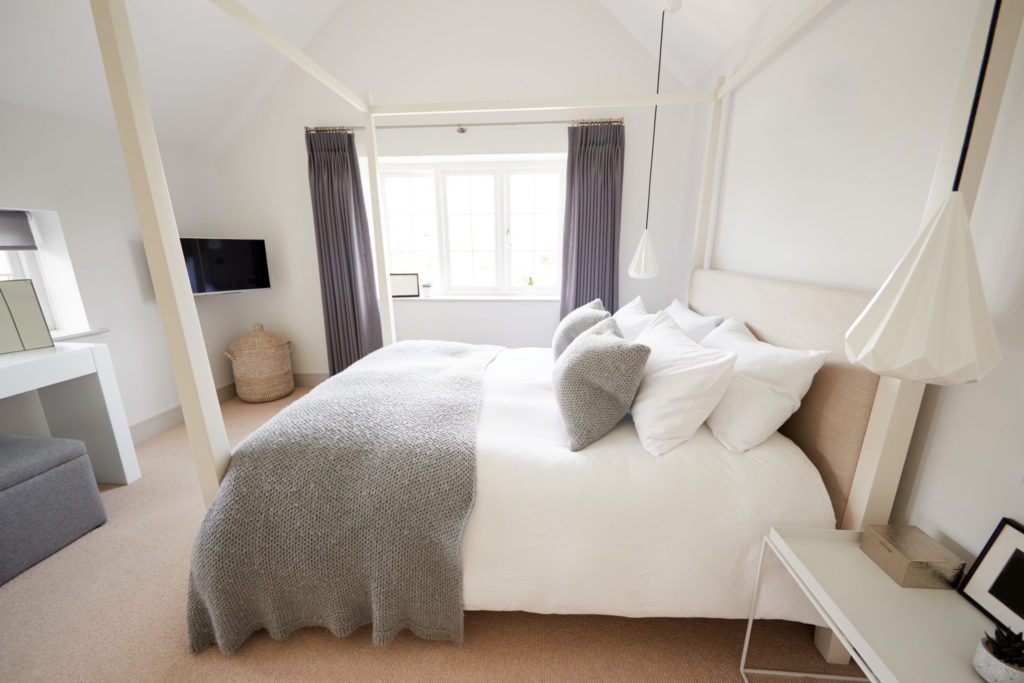 Empty Interior Of Stylish Master Bedroom With Storage