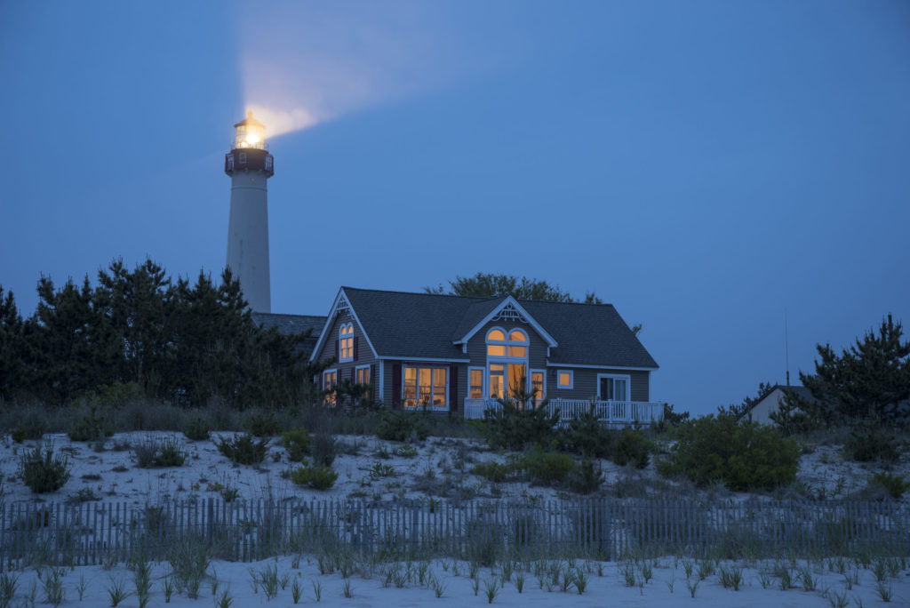 Cape May,USA,Lighthouse beaming near beach house